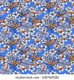Seamless pattern with flowers, palm leaves. Tropical  background. Summer print. Fabric design