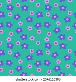 Seamless pattern with flowers. Purple and pink flower seamless on green background.