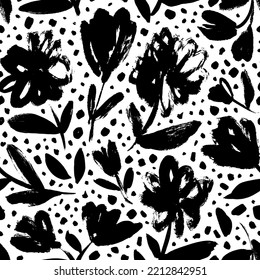 Seamless pattern with flowers silhouettes on stems with leaves. Brush drawn vector flowers with dots on background. Chamomile or daisy illustration painted by brush. Hand drawn botanical ornament. 