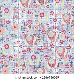 Seamless pattern. Flowers in the squares located chaotically. Background consisting of square ornamental elements.