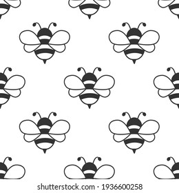 Seamless pattern with flying bees. Vector cartoon black and white bees isolated