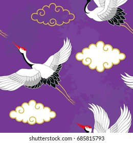 Seamless pattern with flying birds. Crane. Heron. Japanese pattern. Ornament with oriental motifs. Vector.