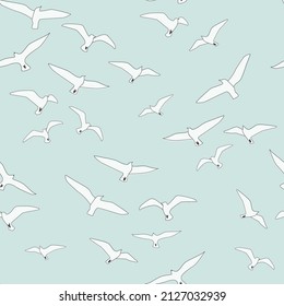 Seamless pattern with flying birds. A flock of seagulls soaring in the sky. Vector graphics.