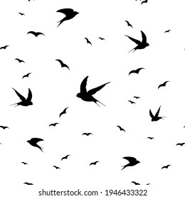 Patrón sin foco con siluetas de aves voladoras. Textura sobre fondo blanco y transparente.