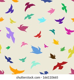 Seamless pattern of flying colorful birds 