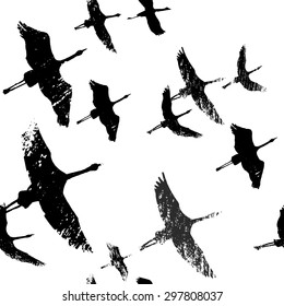 Seamless pattern with flying cranes. Hand drawn background.