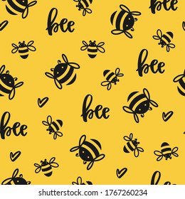 Seamless pattern with flying cute bees and inscription - bee on a yellow background. Vector illustration.