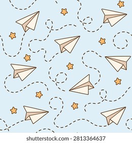 Seamless pattern with flying paper airplanes, dotted lines and stars on a pastel blue background.