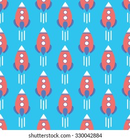 Seamless pattern with flying rocket on blue background