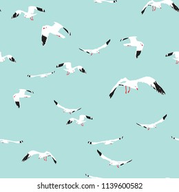 seamless pattern flying seagull on blue background, vector illustration
