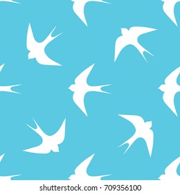 seamless pattern flying swallows