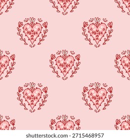 Seamless pattern with folk art or boho hearts decorated with flowers. Symbol of love. Scandinavian hand drawing background. Whimsical design