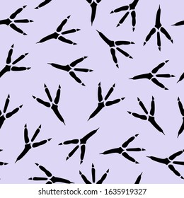 Seamless pattern with footprint of a bird. Vector seamless background with a pattern of traces of bird steps. Fabric textile print