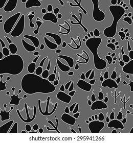 seamless pattern with footprints and bones