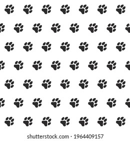 seamless pattern footprints of dog. Black animal tracks. Vector texture for textiles and wallpaper.