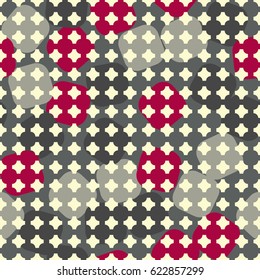 Seamless pattern. In the foreground rows of squares with cropped corners. In the background large squares with rounded edges arranged in a random order. Gray, red, light yellow.