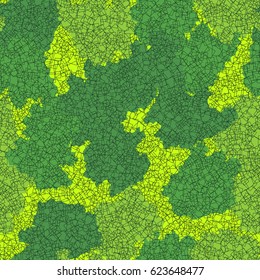 Seamless pattern. In the foreground is the small wire squares built randomly. In the background scattered spots of irregular shape. Fashionable camouflage. Green, black.