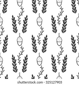 Seamless pattern of forest acorn, branch and grass. Black and white vector illustration