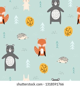 Seamless pattern with forest animals. Kids cute print. Vector hand drawn illustration.