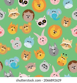 Seamless pattern with forest animals. Vector image on a green background. Animal faces.