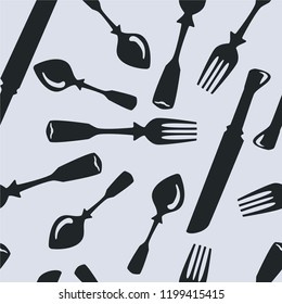 Seamless pattern with forks, spoons and knives. 