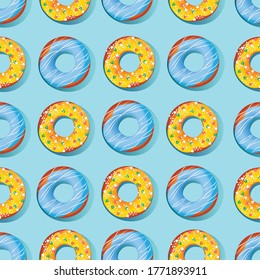 Nahtlose Muster in Form von Süßwaren. Süße Donuts auf hellblauem Hintergrund. Vektordesign.
