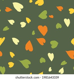 seamless pattern in the form of hearts on a green background. trendy autumn colors for pattern for textiles, bedding, baby clothes