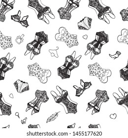 Seamless pattern in the form of lacy underwear for women, drawn on paper by hand, with a black-and-white outline. Graphics, calligraphy.