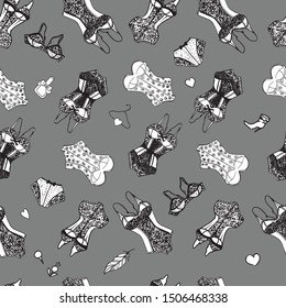 Seamless pattern in the form of lacy underwear for women, drawn on paper by hand, with a black-and-white outline. Graphics, calligraphy.

