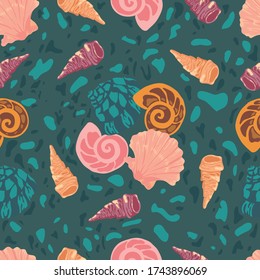 Seamless pattern in the form of shells on a dark turquoise background. Vector illustration.