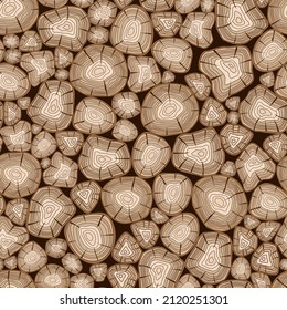 seamless pattern in the form of a stack of firewood with the image of the end sections of trees for interior decoration and background images