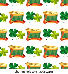 Seamless pattern with four leaf clover and a drum.