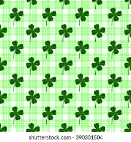 Seamless pattern with four leaves green clovers. St. Patric's Day background 