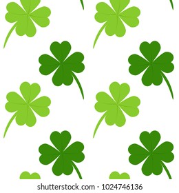 Seamless pattern with four-leaf clover. Vector illustration. Design for banner, card, invitation, postcard, textile, fabric, wrapping paper. Abstract background for St. Patrick's Day