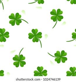 Seamless pattern with four-leaf clover. Vector illustration. Design for banner, card, invitation, postcard, textile, fabric, wrapping paper. Abstract background for St. Patrick's Day.