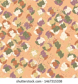 Seamless pattern. Four-sided multi-colored round elements are arranged randomly. Colors of the autumn landscape. Shades of brown and yellow.