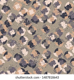 Seamless pattern. Four-sided multi-colored round elements are arranged randomly. Colors of the autumn landscape. Shades of brown and yellow.