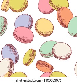 Seamless pattern with french macaroons. Hand drawn vector illustration in vintage engraving style on white background. Sweet colorful dessert.