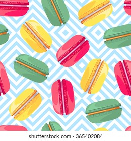 Seamless pattern with french sweet macaroons. Sweet donuts isolated on zig zag background. Delicious desserts. Fresh bakery. Can be used in food industry for wallpapers, poster, wrapping paper. Vector