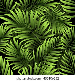 Seamless pattern with fresh green tropical palm tree leaves and branches on a black background