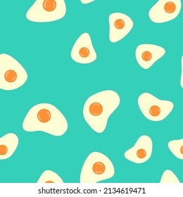 Seamless pattern with fried eggs. Abstract pastel pattern with eggs. Random, chaotic blue background with cute omelette.