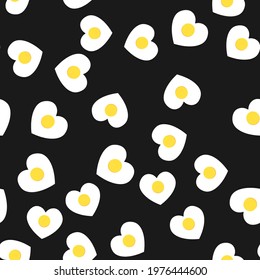 Seamless pattern with fried eggs on black background. Vector illustration