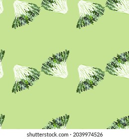 Seamless pattern frisee salad on light green background. Abstract ornament with lettuce. Diagonal plant template for fabric. Design vector illustration.