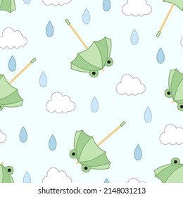 Seamless pattern of frog umbrellas, clouds and raindrops. Kawaii style. On a blue background.