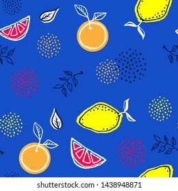 Seamless pattern of fruits in cool graphic style. Lemons, oranges, branches and leaves. Cute vector background.