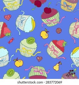 seamless pattern with fruits cupcakes