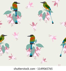 A seamless pattern with fuchsia flowers and exotic birds. For decorating textiles, packaging and wallpaper. Vector illustration.