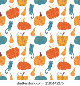 Seamless pattern with funny autumn ornament, cute cats and pumpkins. For designing prints on fabrics, childrens textiles, wallpaper, wrapping paper. Vector graphics on a white background.