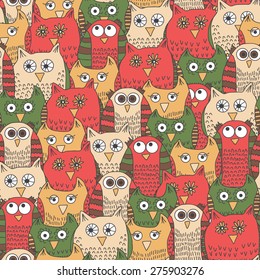 Seamless pattern with funny bright owls in cartoon style. Vector illustration
