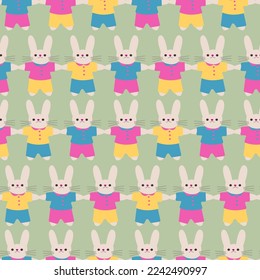 Seamless pattern with funny cartoon Bunnies. Flat design. Vector.